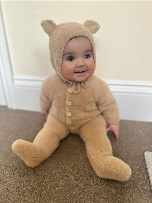 Beige fluffy onesie with matching hat