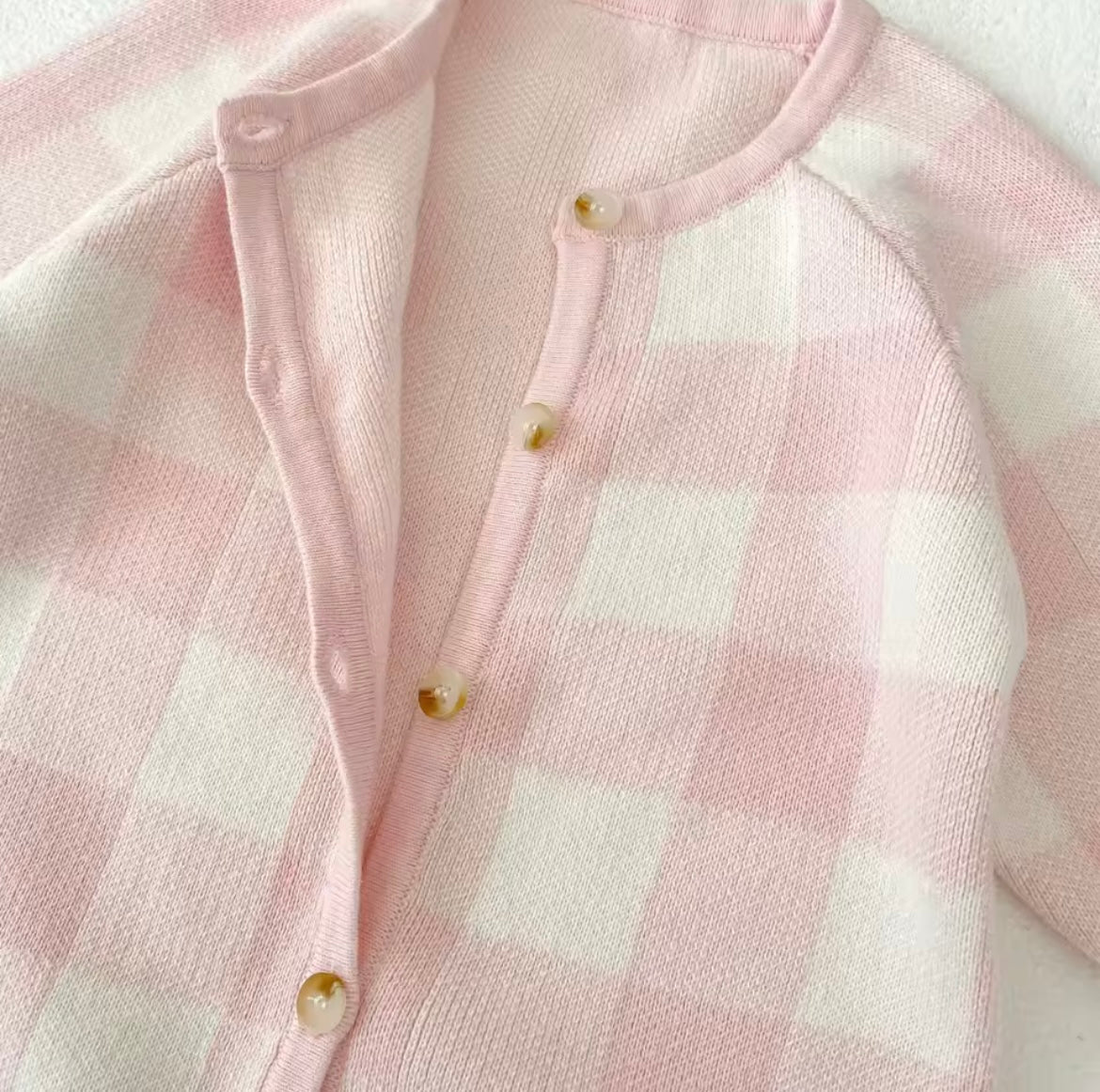 Pink check onesie
