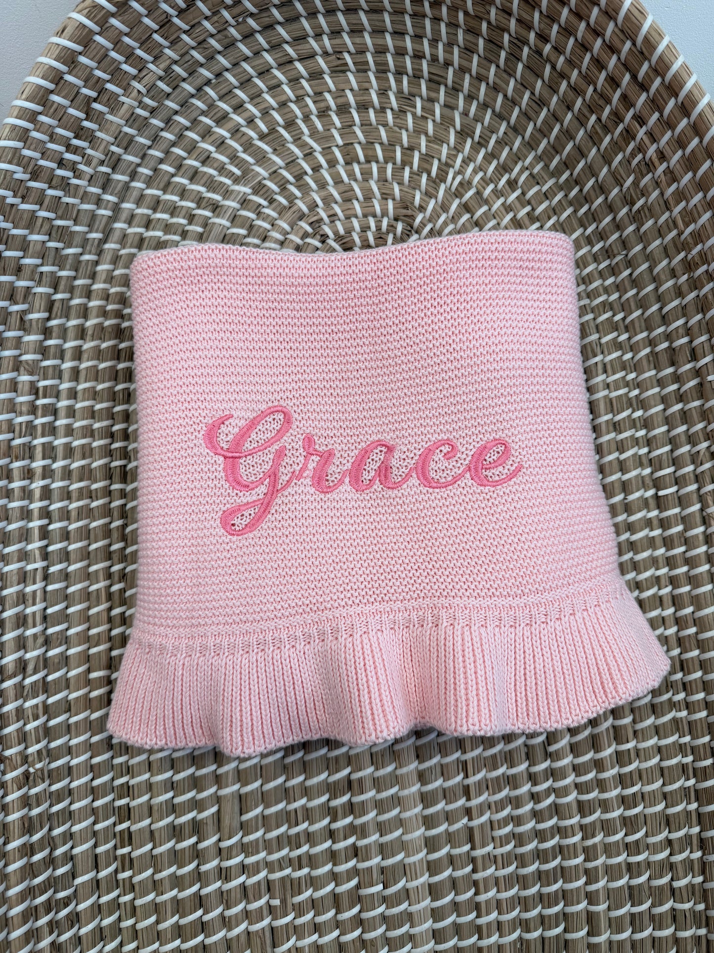 Personalised knitted frill blanket