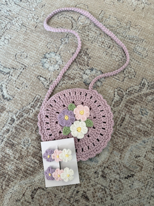 Hand knitted round baby bag and clips set