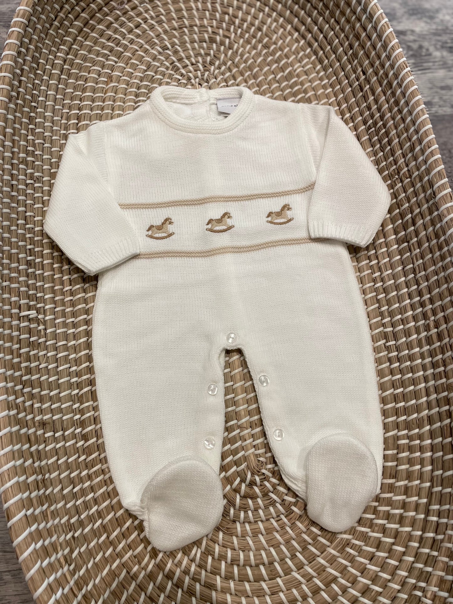 The rocking horse knitted onesie