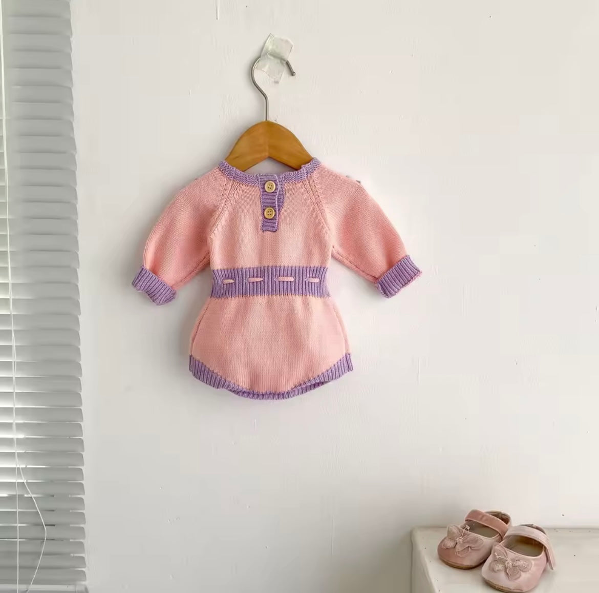Pink and purple knitted romper