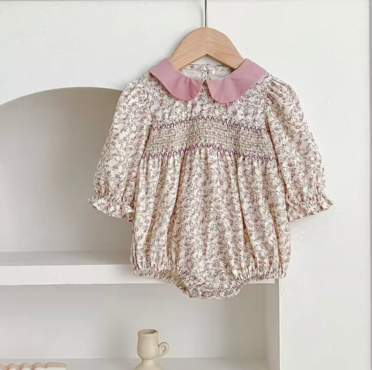 Pink smocked romper