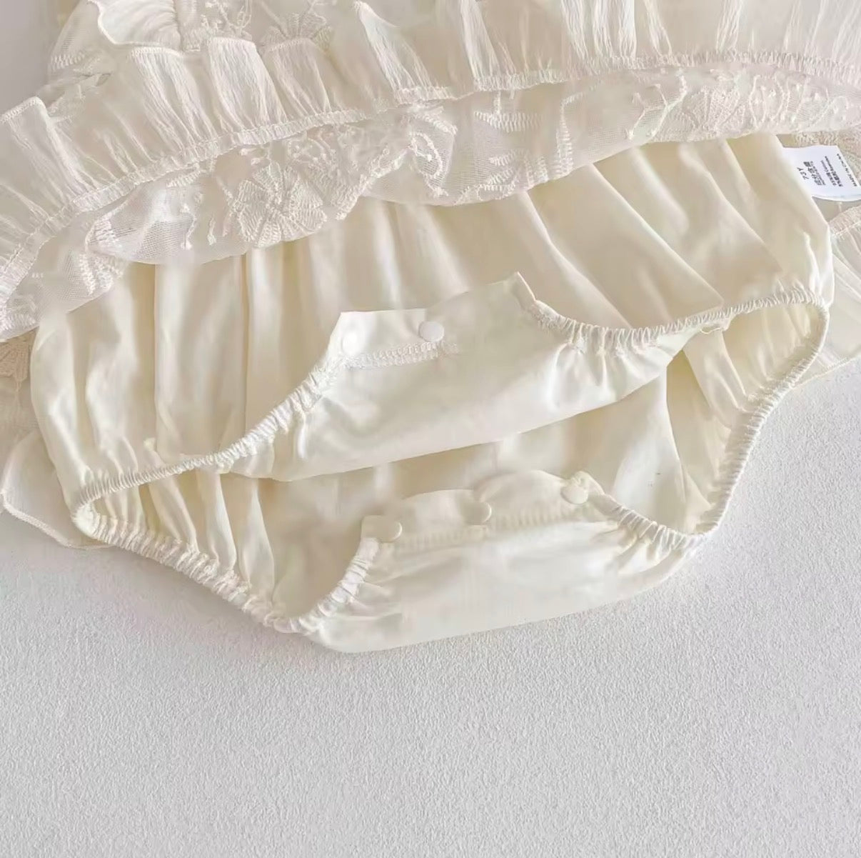 Cream embroidered frill baby romper