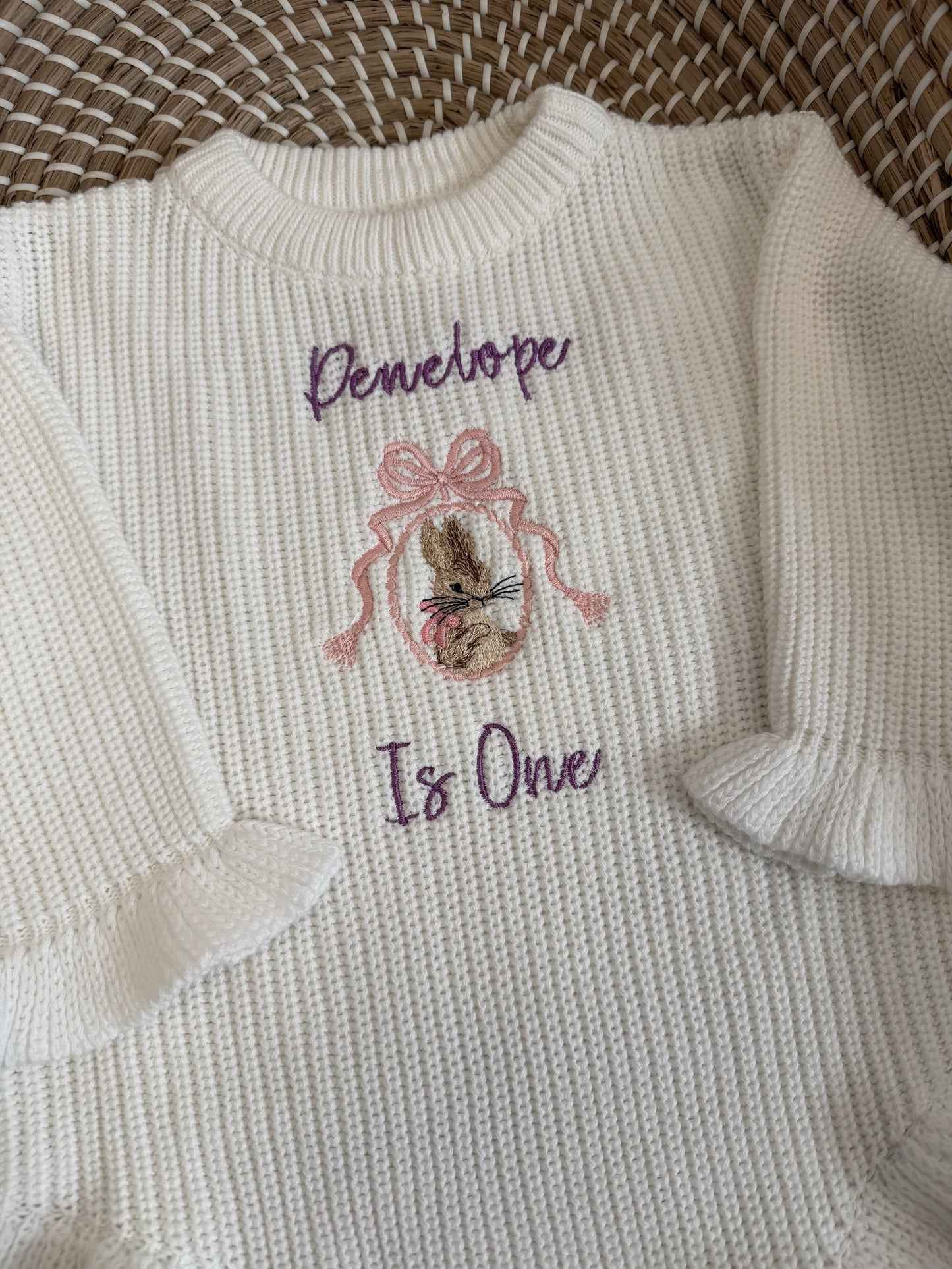 Personalised knitted frill romper