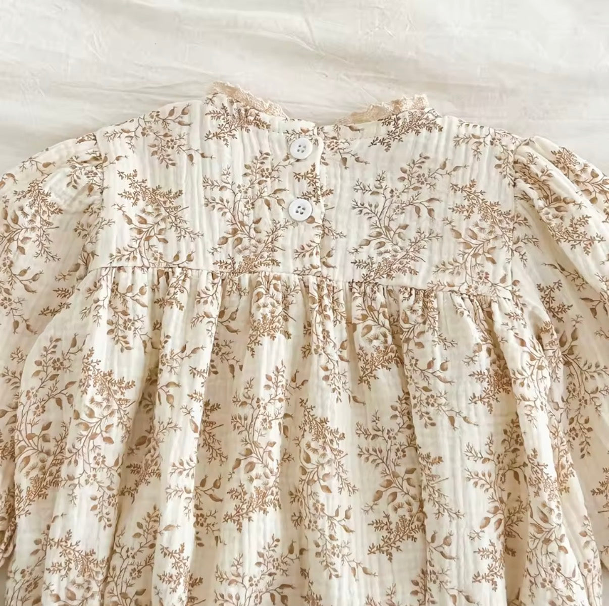Beige Floral romper - long sleeved