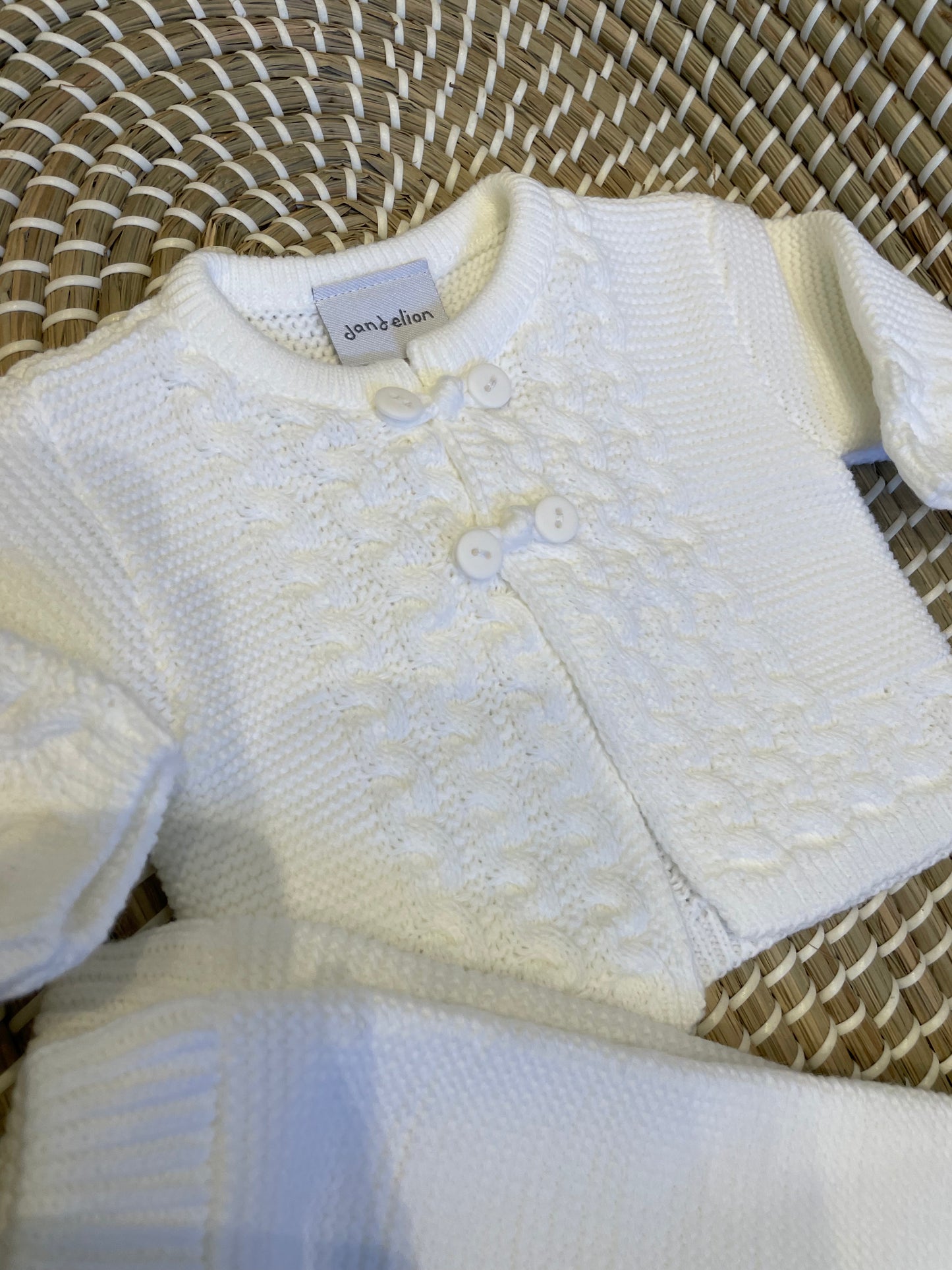 The white knit 2pc button loop set