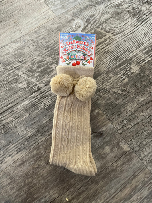 Beige knee high pom pom socks