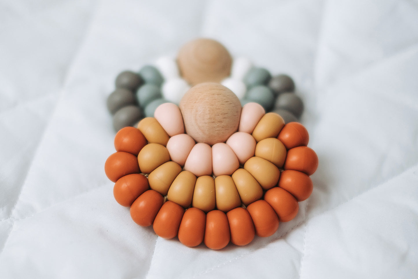 Orange rainbow teether