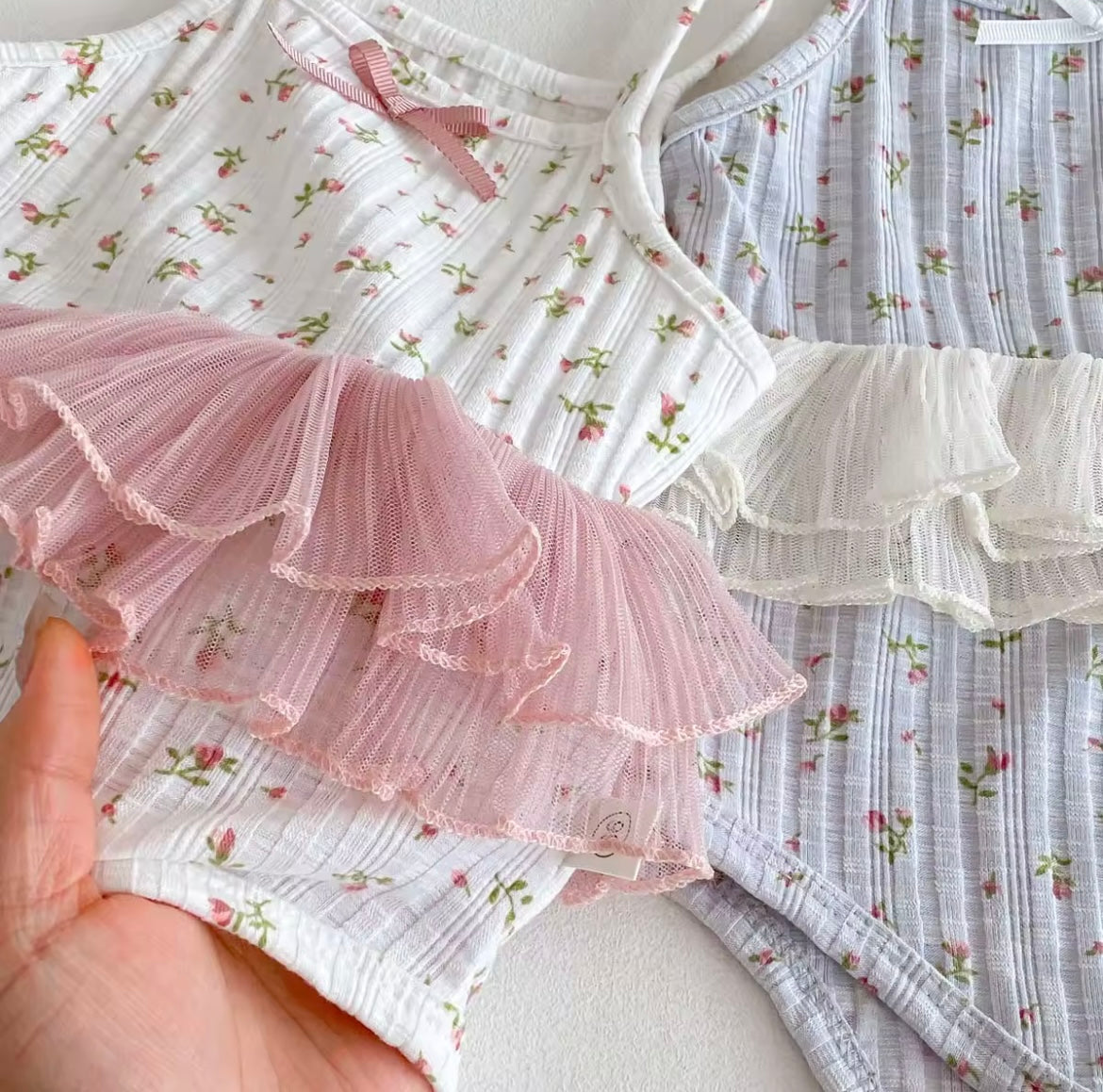 Pink floral body suit