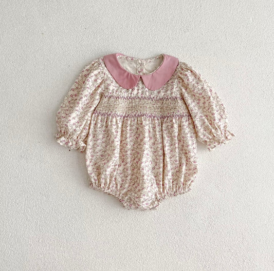 Pink smocked romper