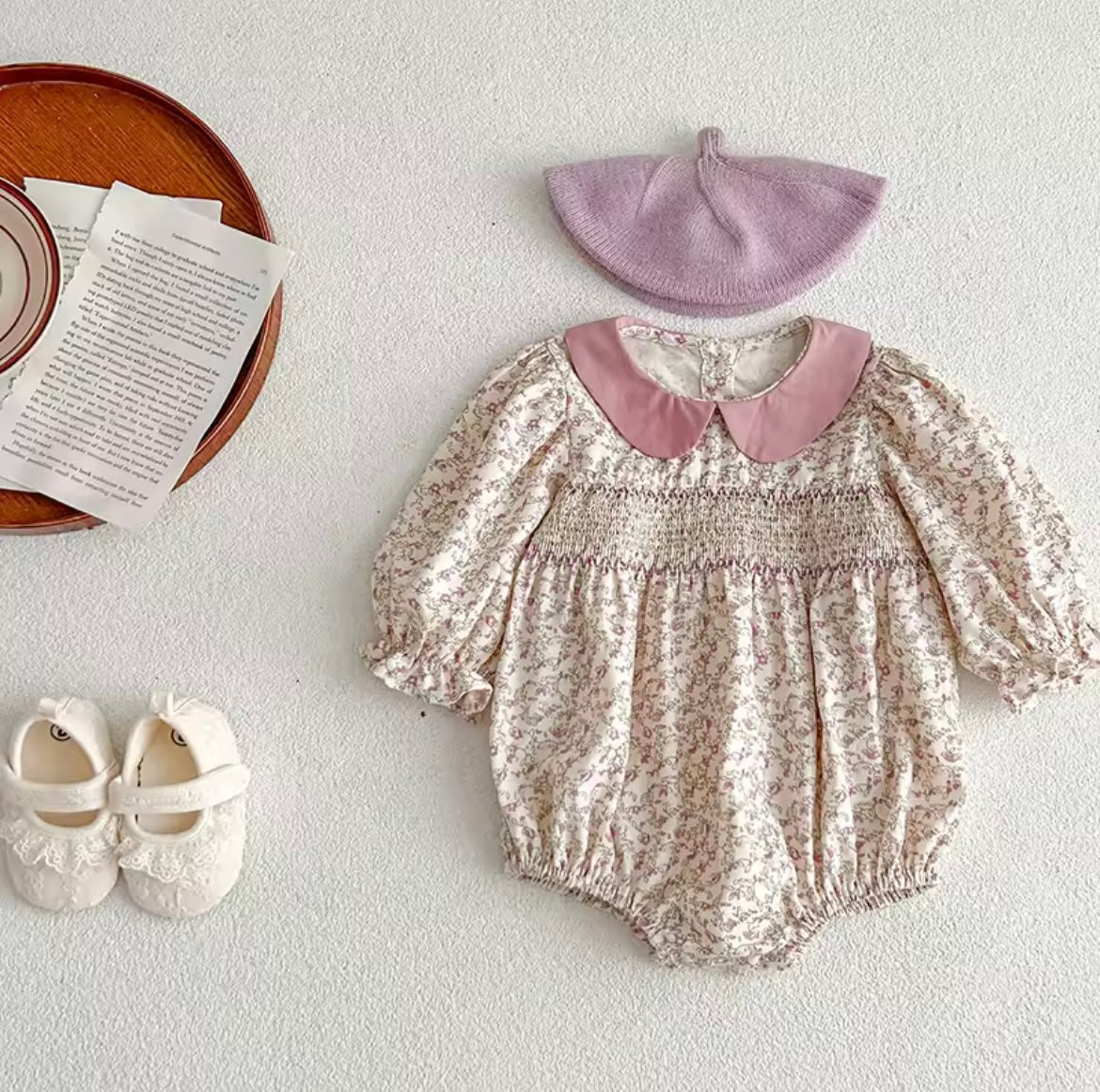 Pink smocked romper