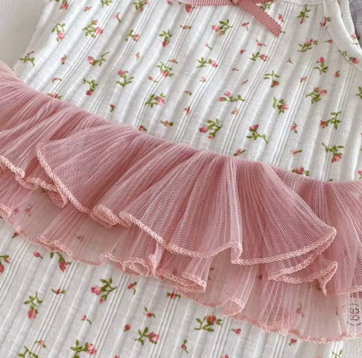 Pink floral body suit