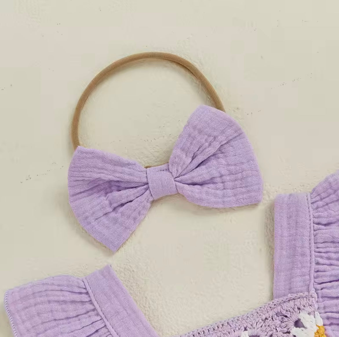 Purple crochet baby romper