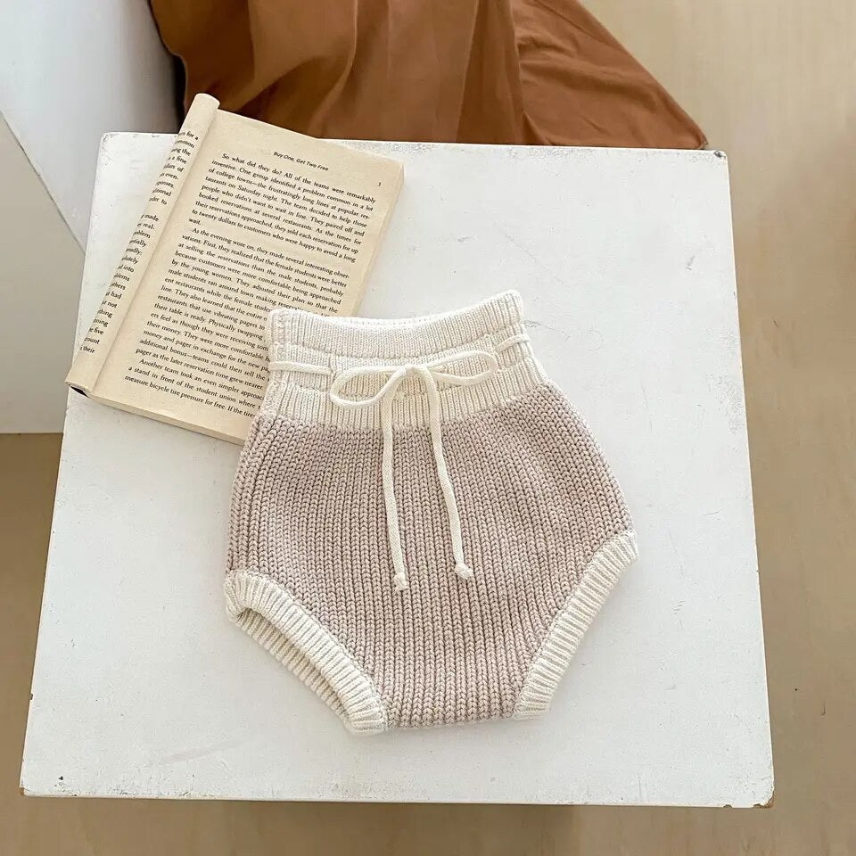 The cream and beige knitted set