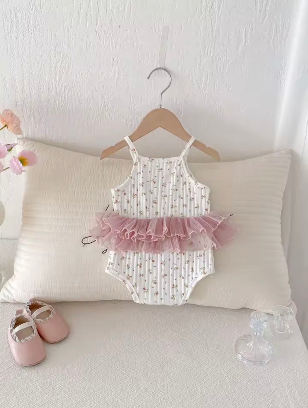 Pink floral body suit