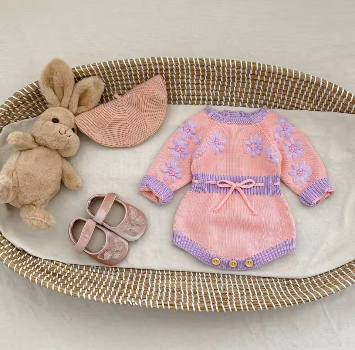 Pink and purple knitted romper