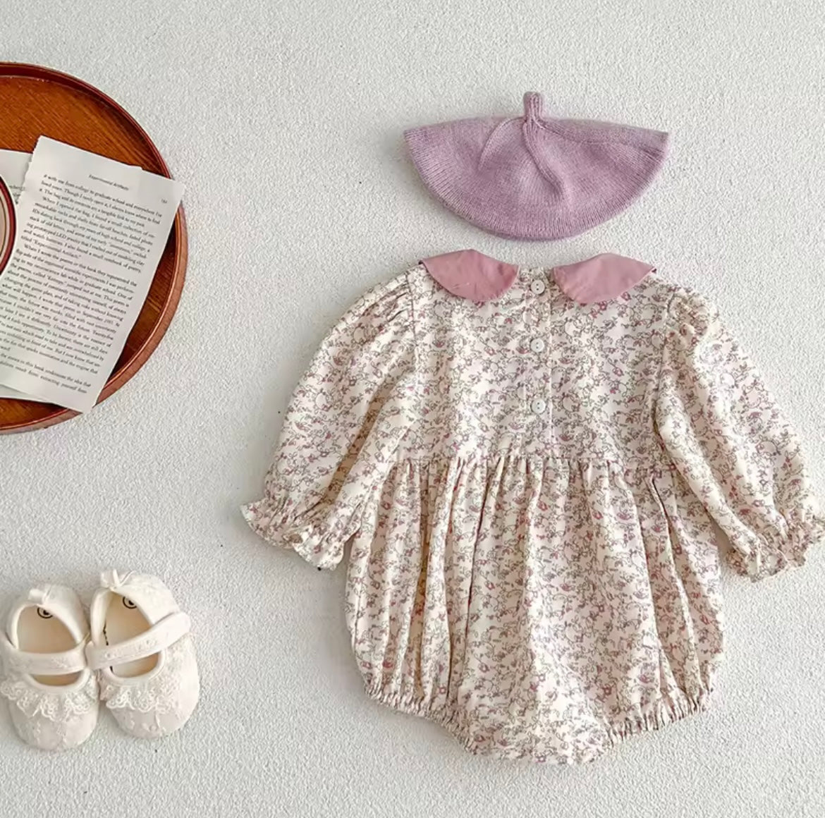 Pink smocked romper