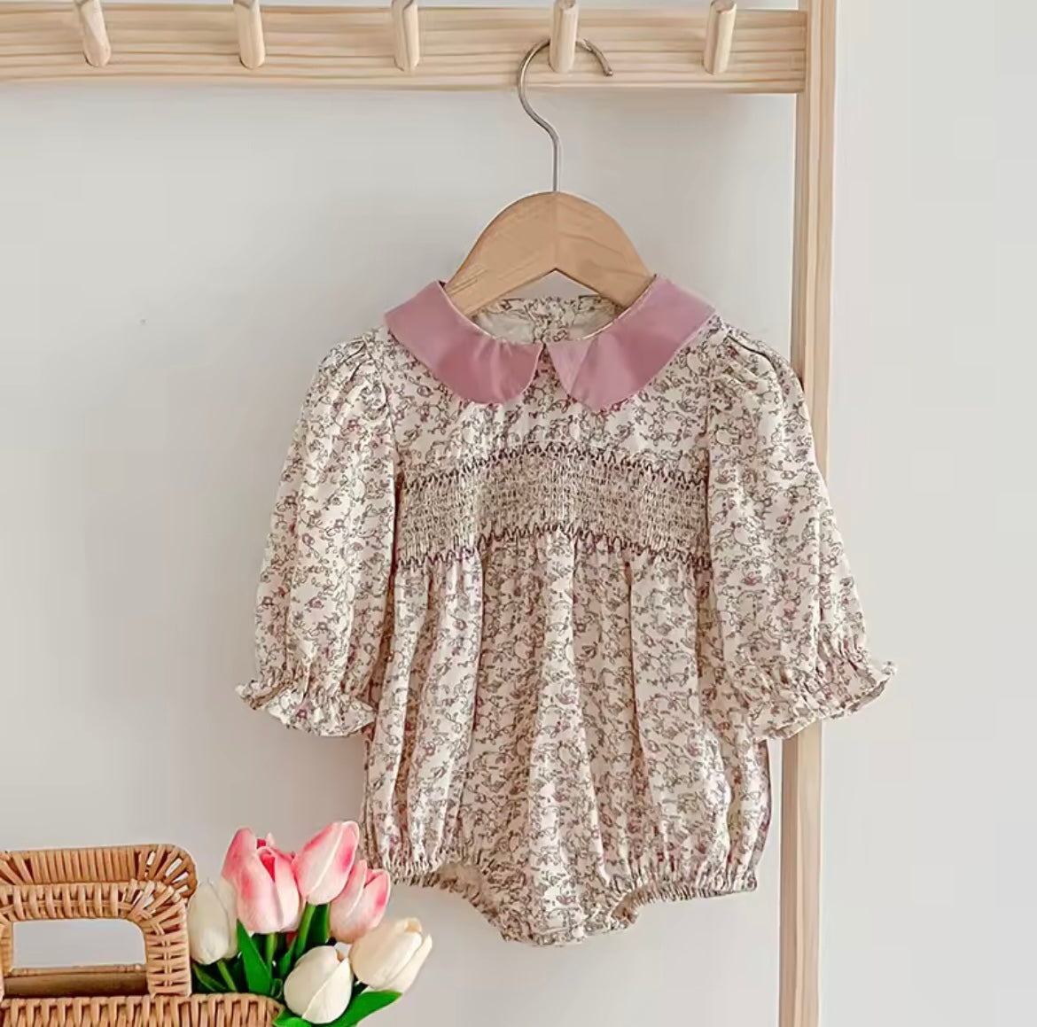 Pink smocked romper