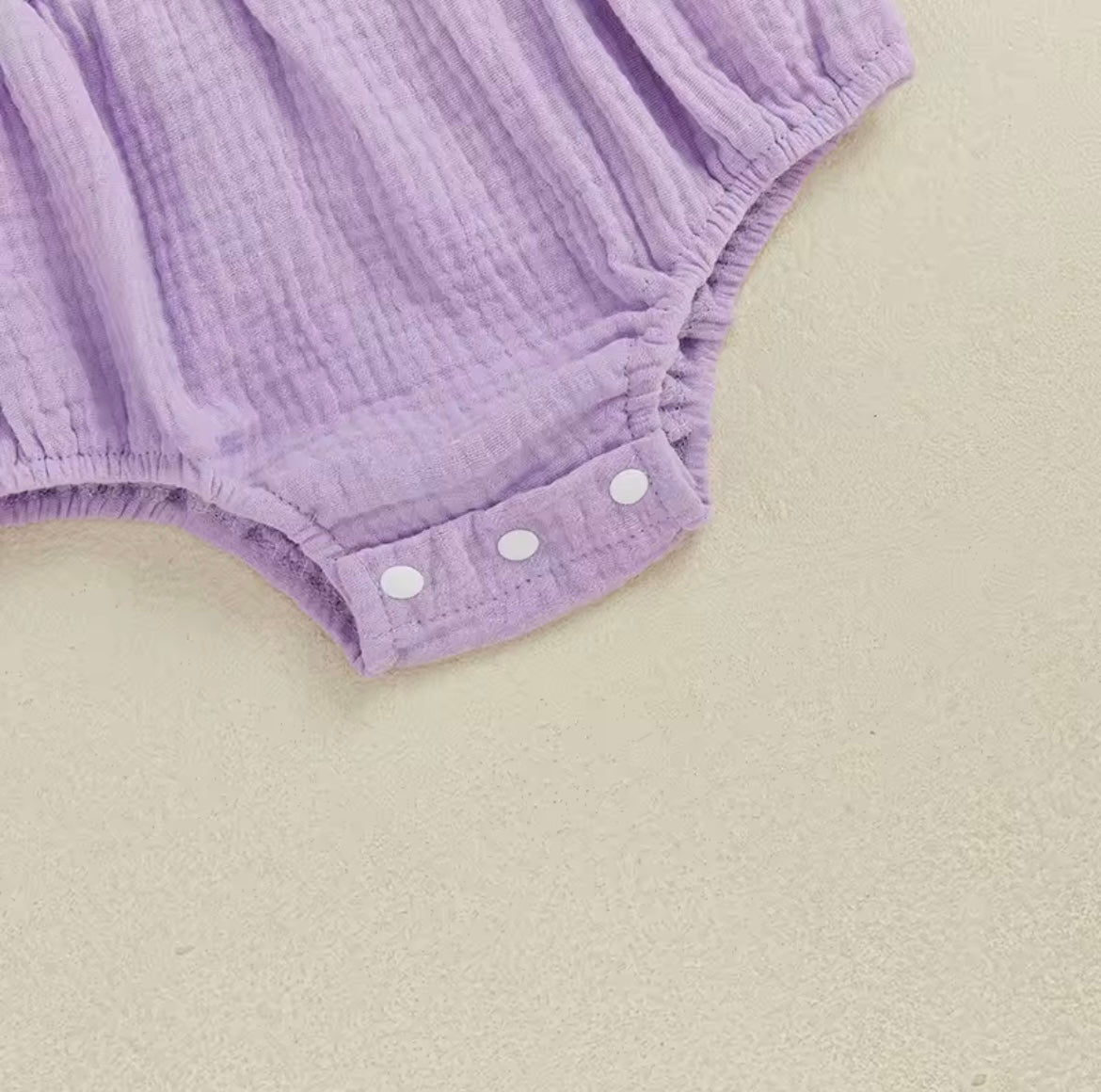 Purple crochet baby romper