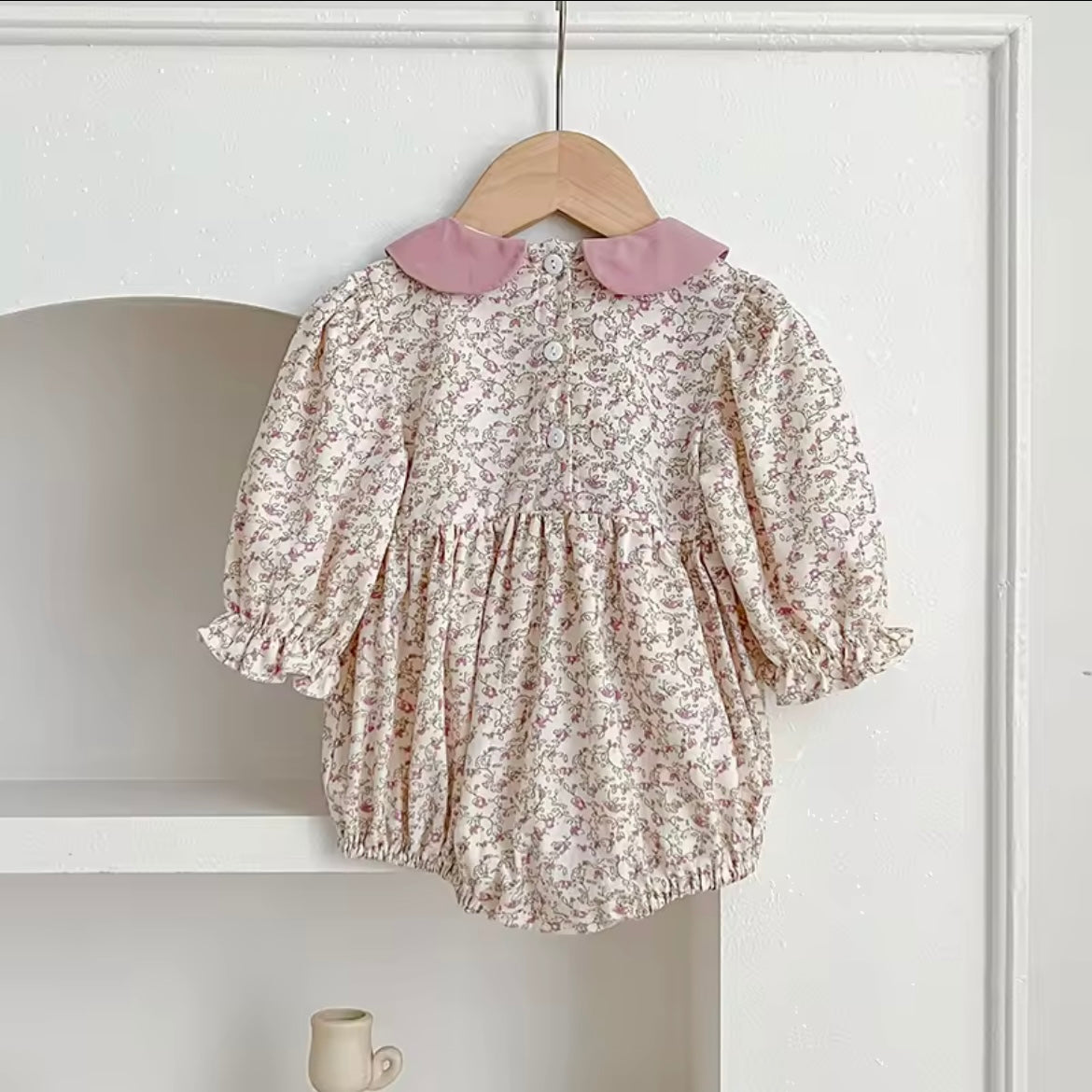 Pink smocked romper