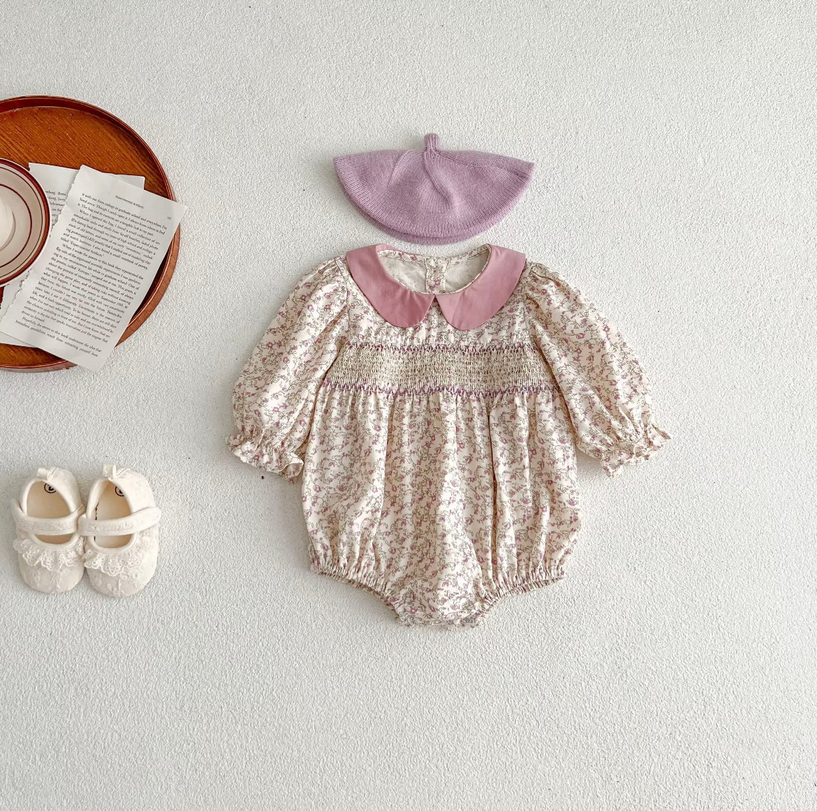 Pink smocked romper
