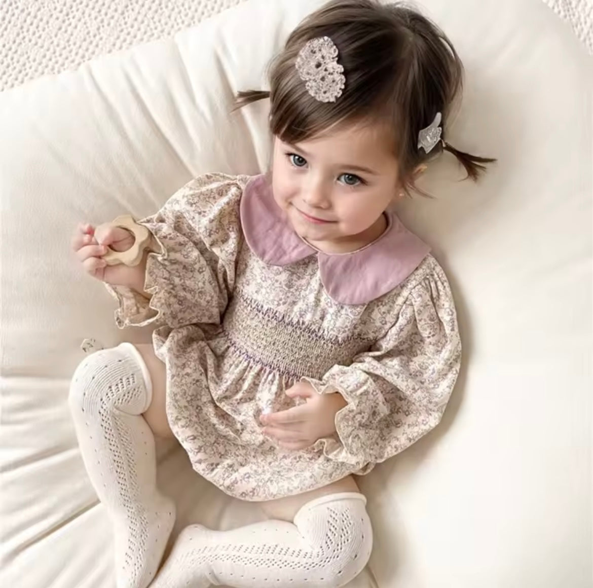 Pink smocked romper