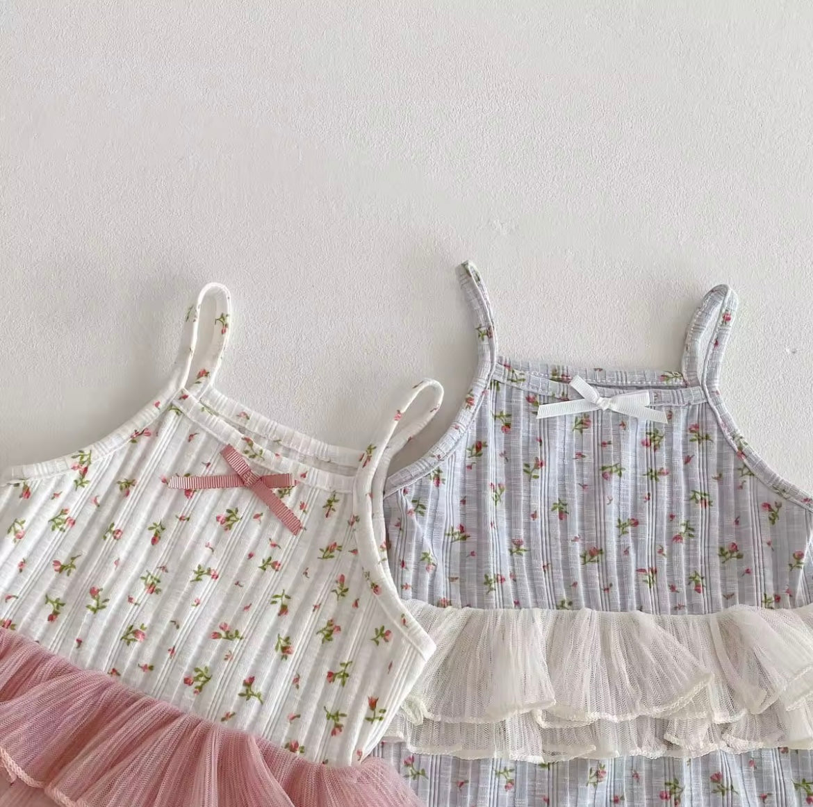 Pink floral body suit