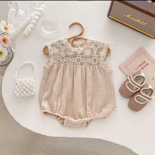 Beige crochet baby romper