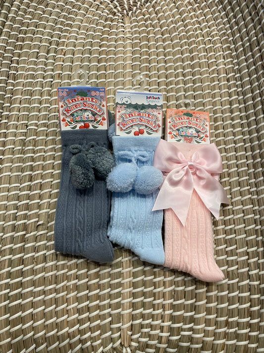 Baby blue knee high pom pom socks